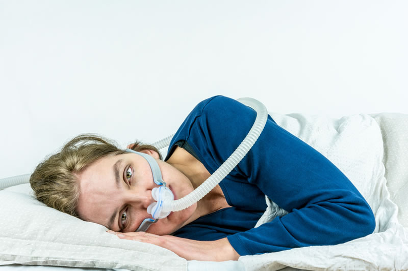 Woman unable to sleep because of uncomfortable CPAP mask 